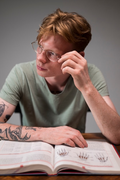 Young man learning in a virtual classroom