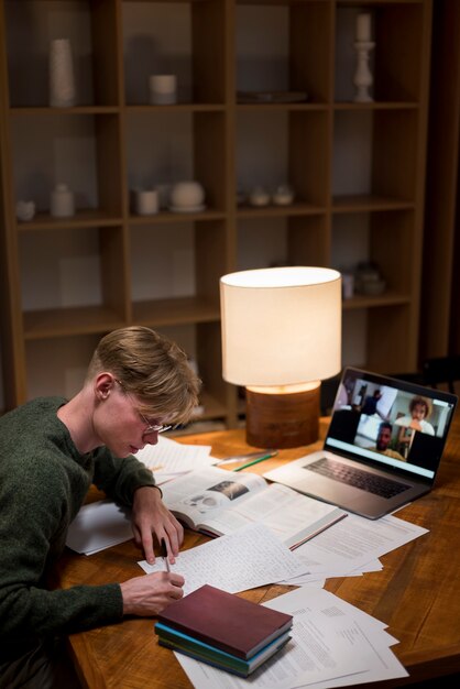 Free Photo young man learning in a virtual classroom