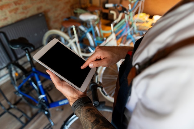 Young man managing his bike business