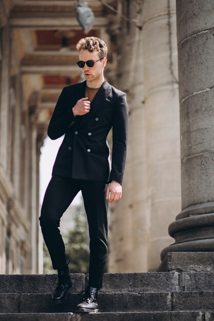 Young man model posing in the street