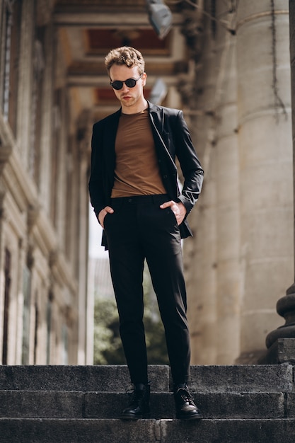 Young man model posing in the street