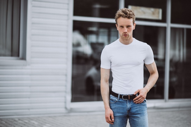 Free Photo young man model posing in the street