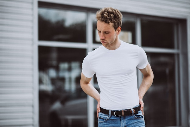 Free Photo young man model posing in the street