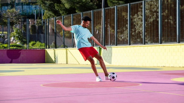 Young man playing football