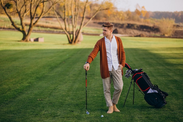 Young man playing golf