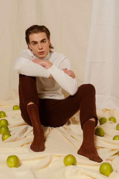 Free photo young man portrait with flowers