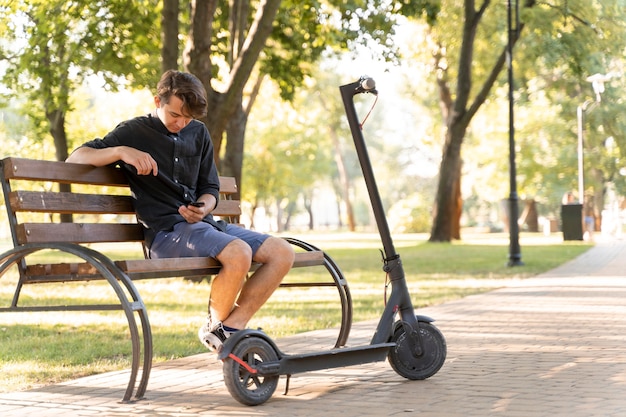 Free photo young man relaxing outdoors