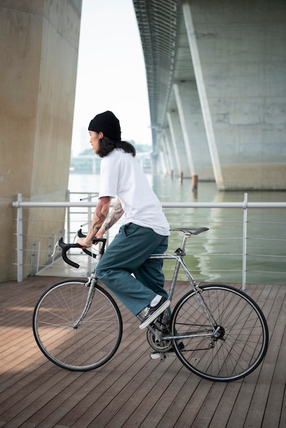 Young man riding his bike