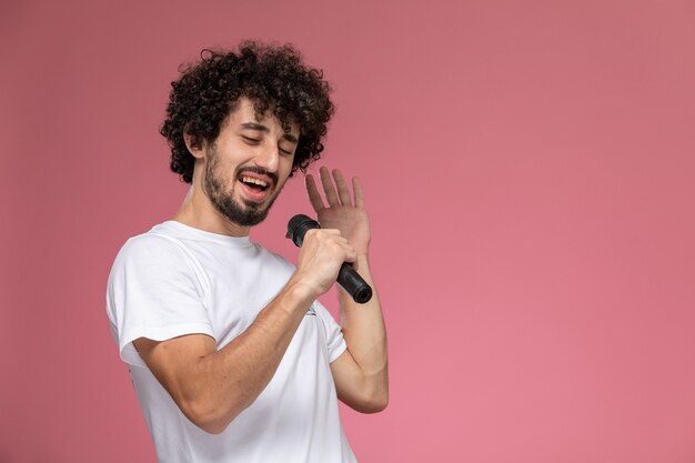 young man singing with his microphone