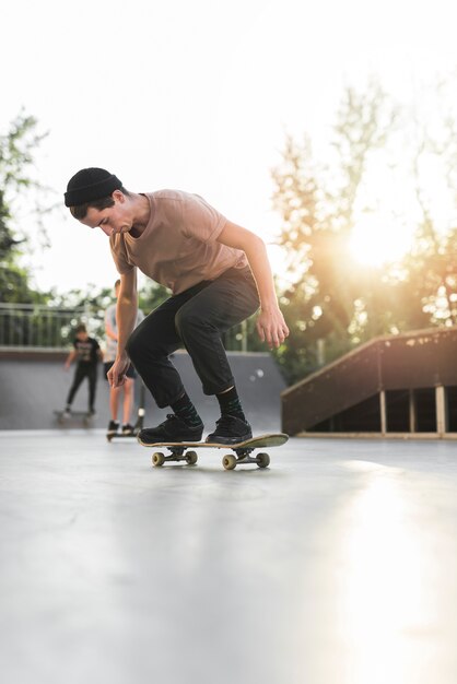 Young man skateboarding in the street