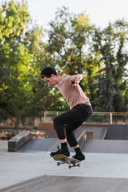 Young man skateboarding in the street