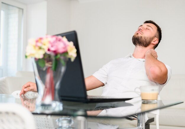 Young man taking a break for relaxation at the office