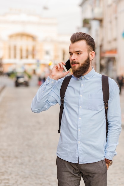 Young man talking on mobile phone