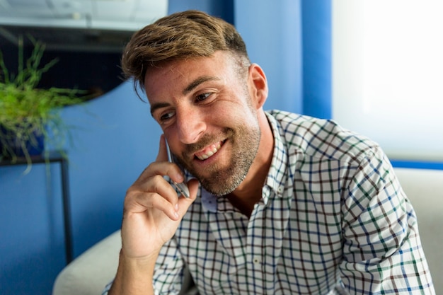 Young man talking on the phone