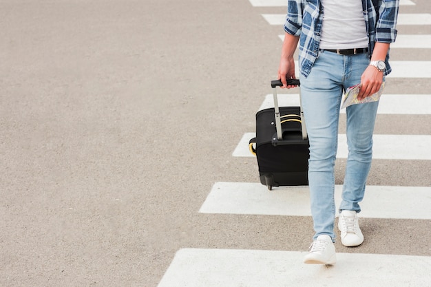 Young man traveling around the world