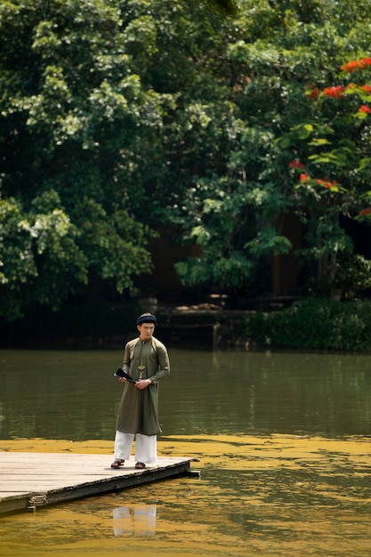 Young man wearing ao dai costume