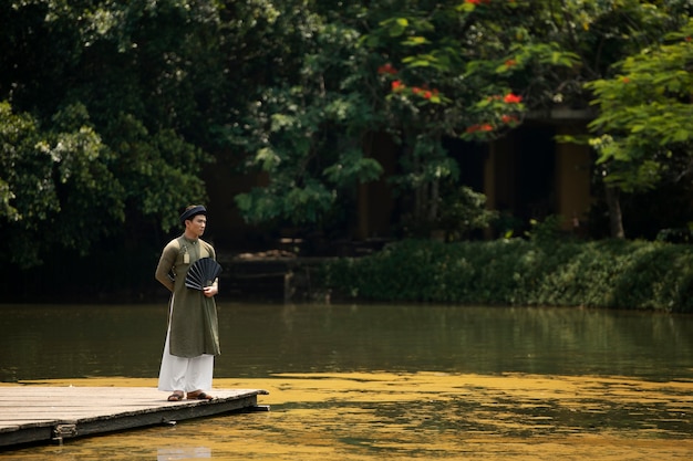 Young man wearing ao dai costume