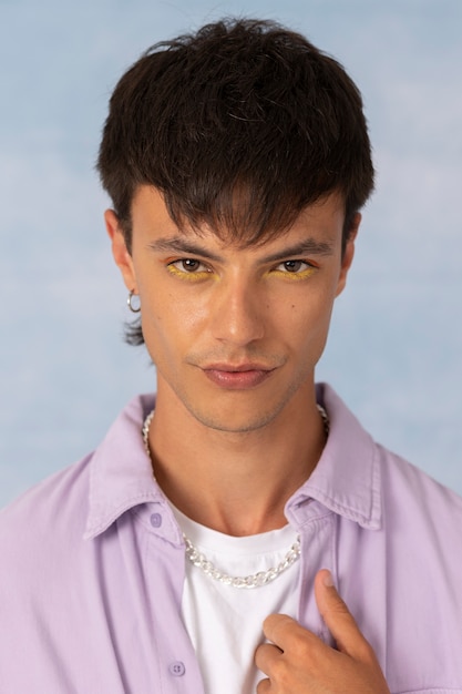 Young man wearing chain necklace