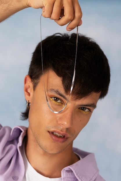 Young man wearing chain necklace