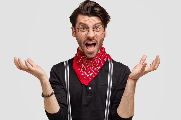 Young man wearing red bandana and black shirt