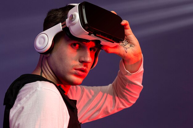 Young man wearing virtual reality goggles