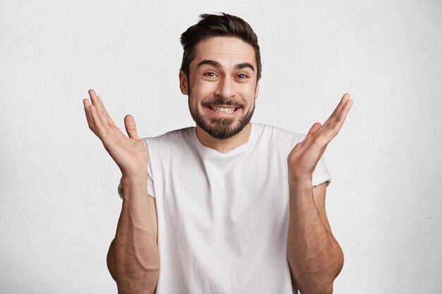 Young man with beard and white T-shirt