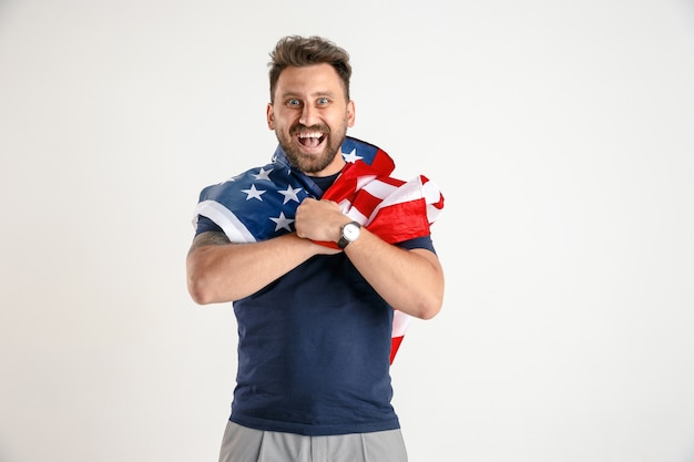 Free photo young man with the flag of united states of america