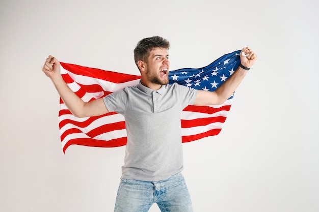 Free photo young man with the flag of united states of america