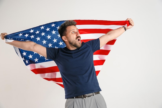 Free photo young man with the flag of united states of america