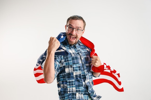 Free photo young man with the flag of united states of america