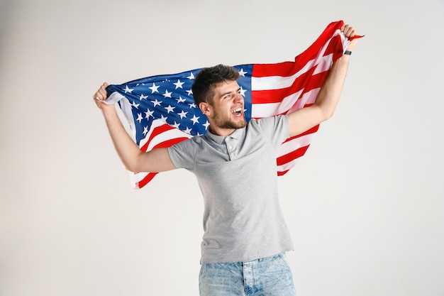 Young man with the flag of United States of America