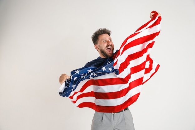 Free photo young man with the flag of united states of america