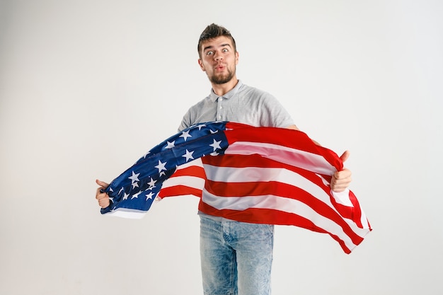 Free photo young man with the flag of united states of america