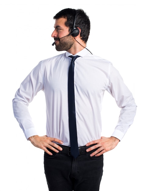 Young man with a headset looking lateral