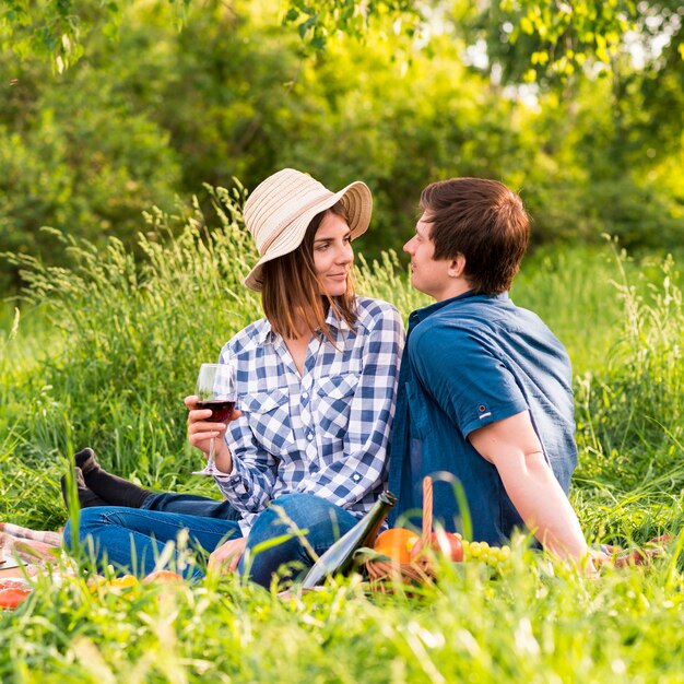 Young man and woman on picnic date