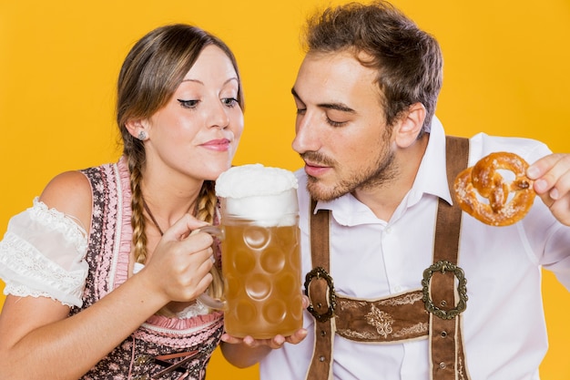 Young man and woman ready to taste beer