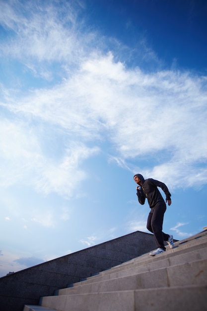 Free photo young man working out for marathon