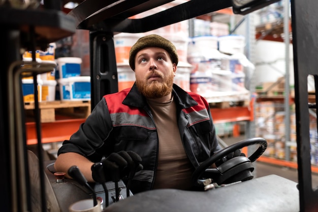 Young man working in a warehouse