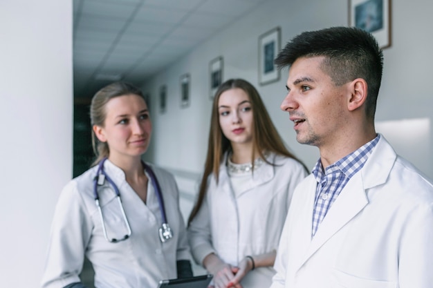 Young medics standing in clinic