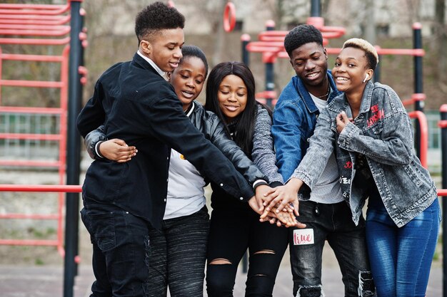 Young millennials african friends on outdoor gym Happy black people having fun together Generation Z friendship concept