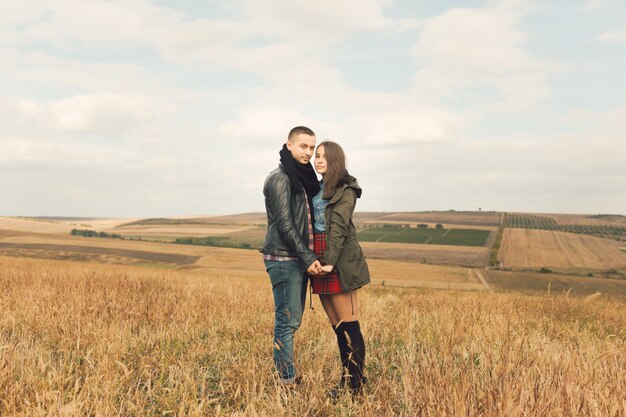 Young modern stylish couple outdoors