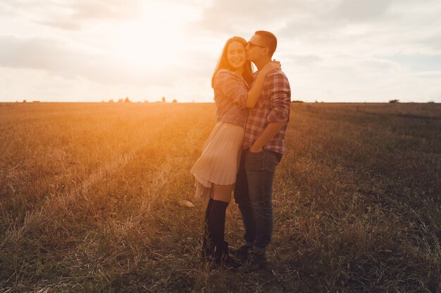 Young modern stylish couple outdoors