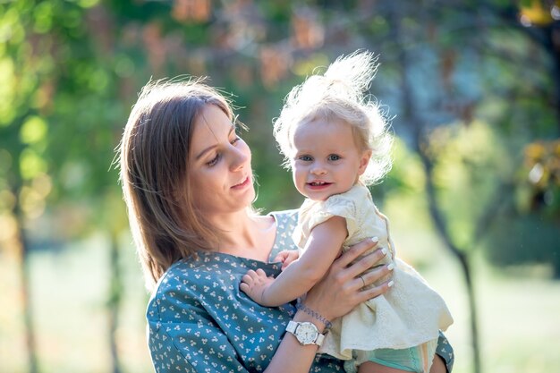 Young mother with cute daughter