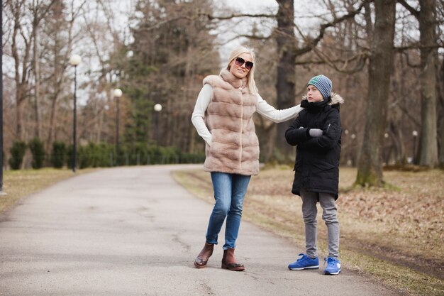 Young mother with her son in the park