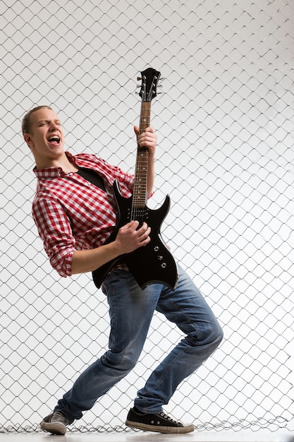 Young musician with a guitar