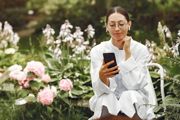 Young nurse in outdoor. Woman doctor. Image for advertising scientific developments in the food and medical industry.