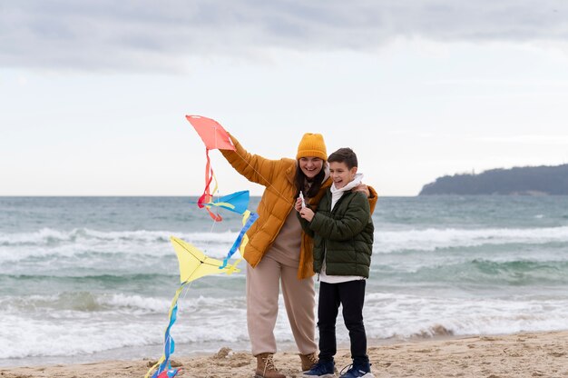 Young people getting their kite up