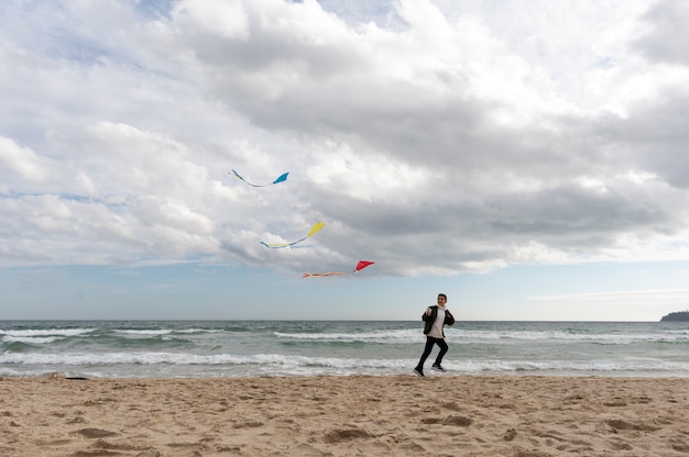 Young people getting their kite up