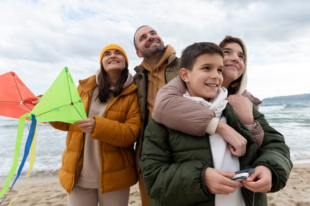 Young people getting their kite up