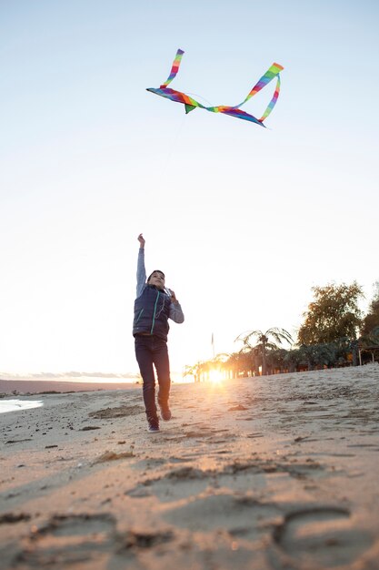 Young people getting their kite up